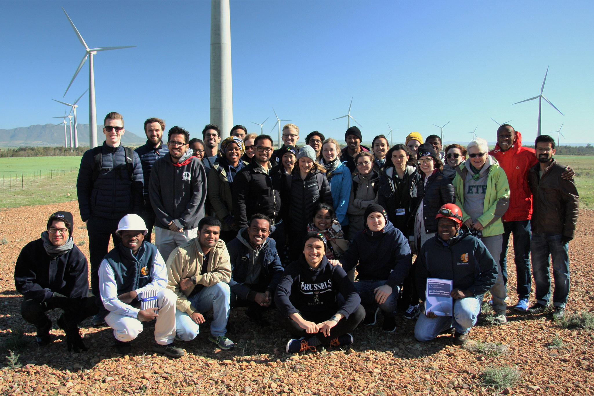 Group picture at the Gouda Wind Farm, one of the largest wind-farms in Southern Africa with 138 MW nameplate capacity. Photo credit: Energy Politics Group and ETH Global.