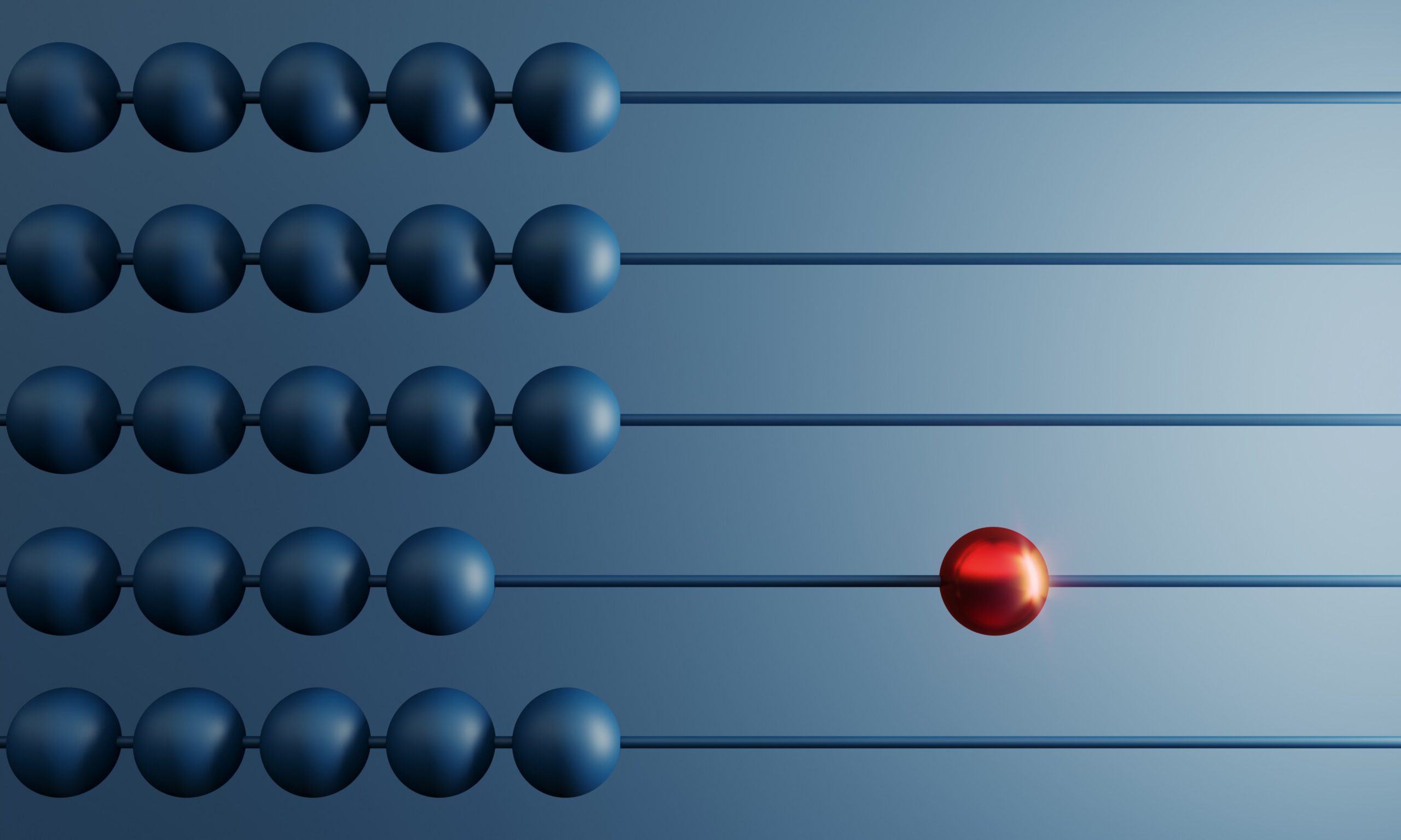 Different red colored ball between others on abacus.